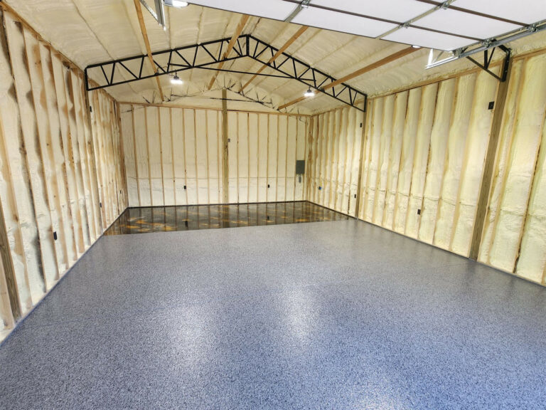 Large insulated metal building with gray epoxy flake flooring and a decorative metallic epoxy section