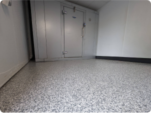 Seamless epoxy flake floor installation in a commercial cold storage or industrial setting